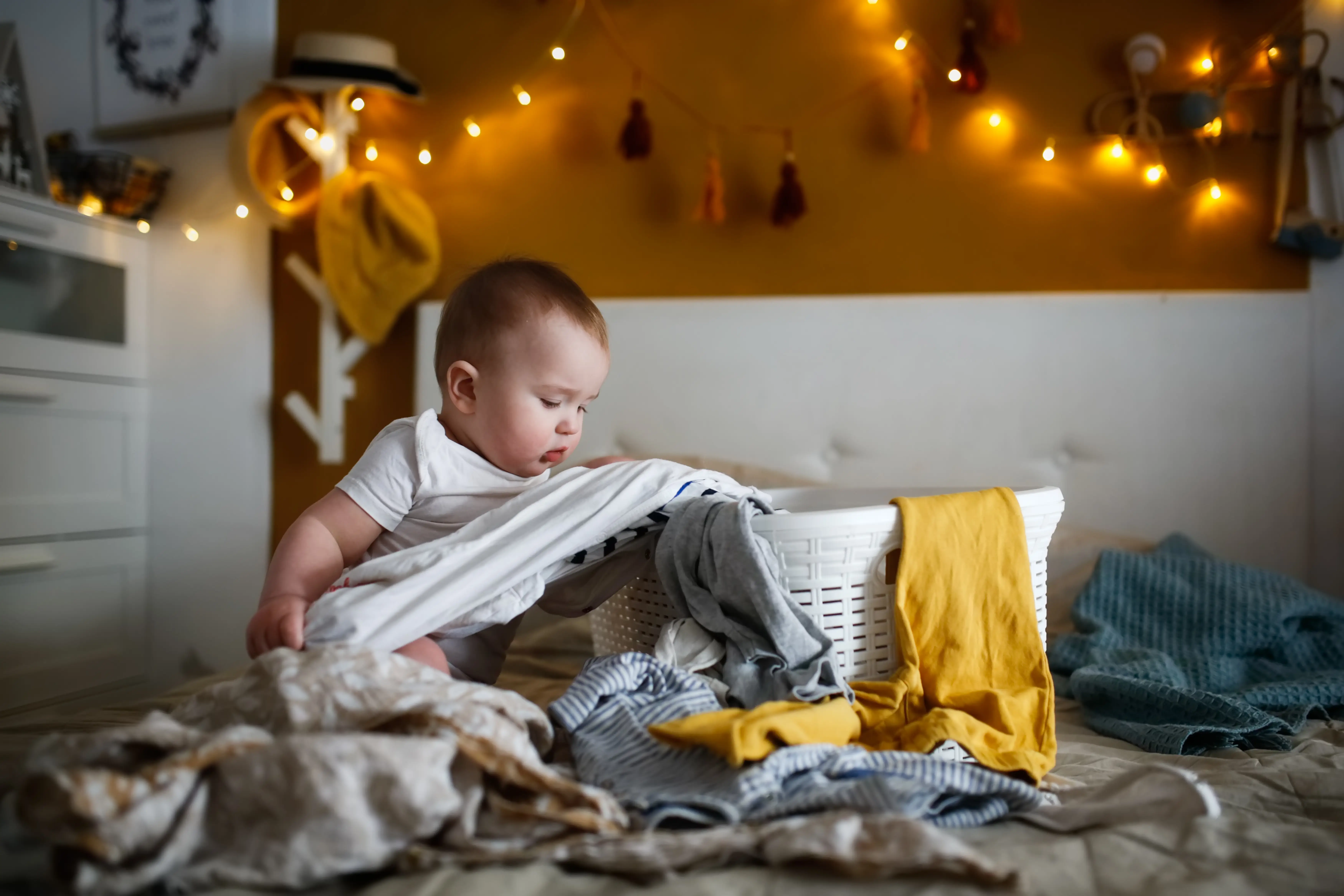 Baby In A Laundry Pile
